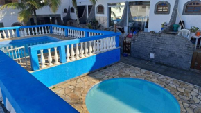 Aconchegante casa à beira da praia
